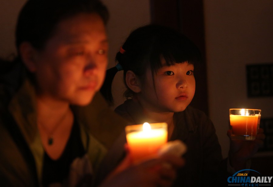 馬航MH370失聯客機整月 家屬為親人祈福守望
